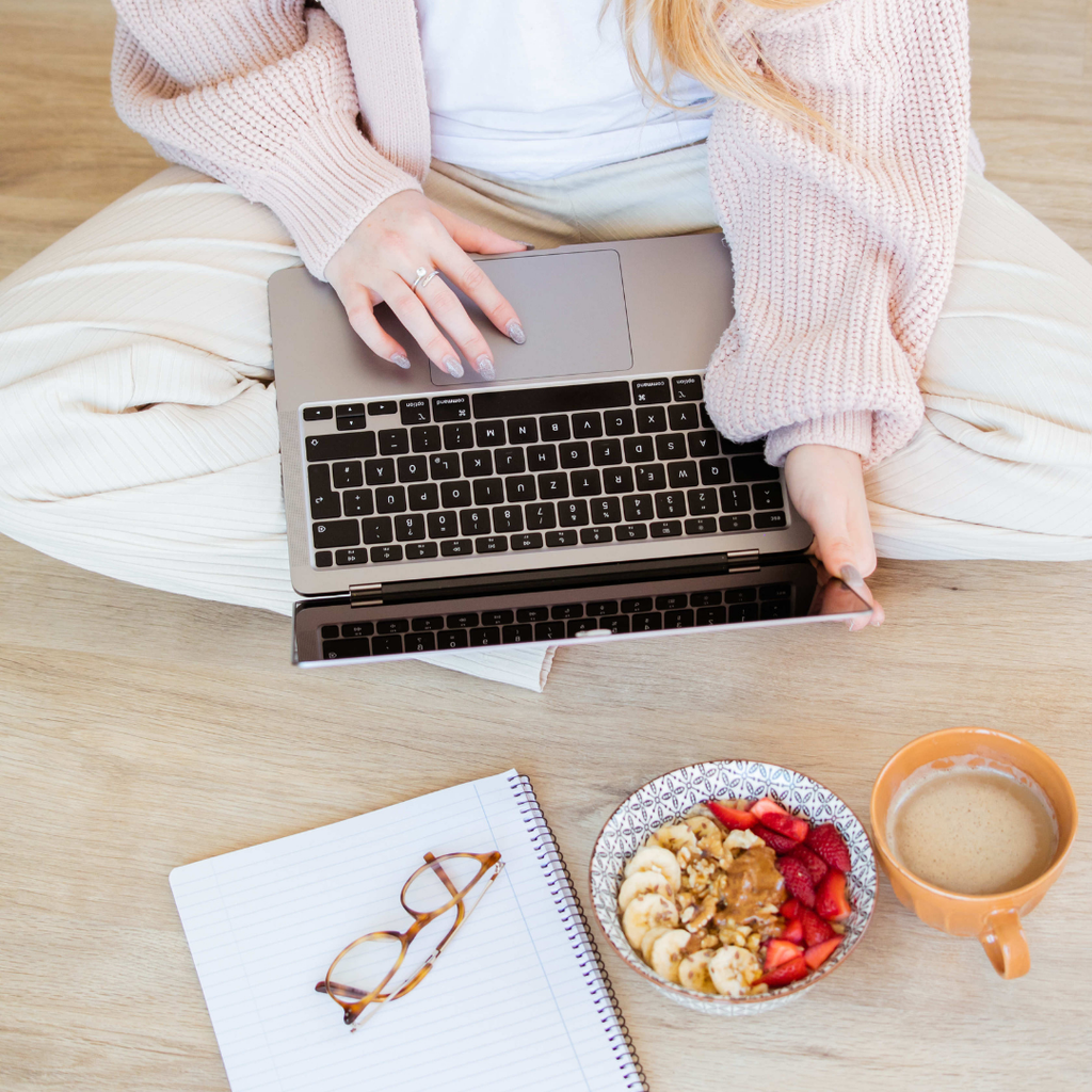 woman blogging on laptop 