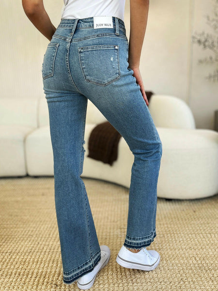 Judy Blue Full Size Mid Rise Bootcut Destroyed Hem Distressed Jeans | Sleekdenim.com