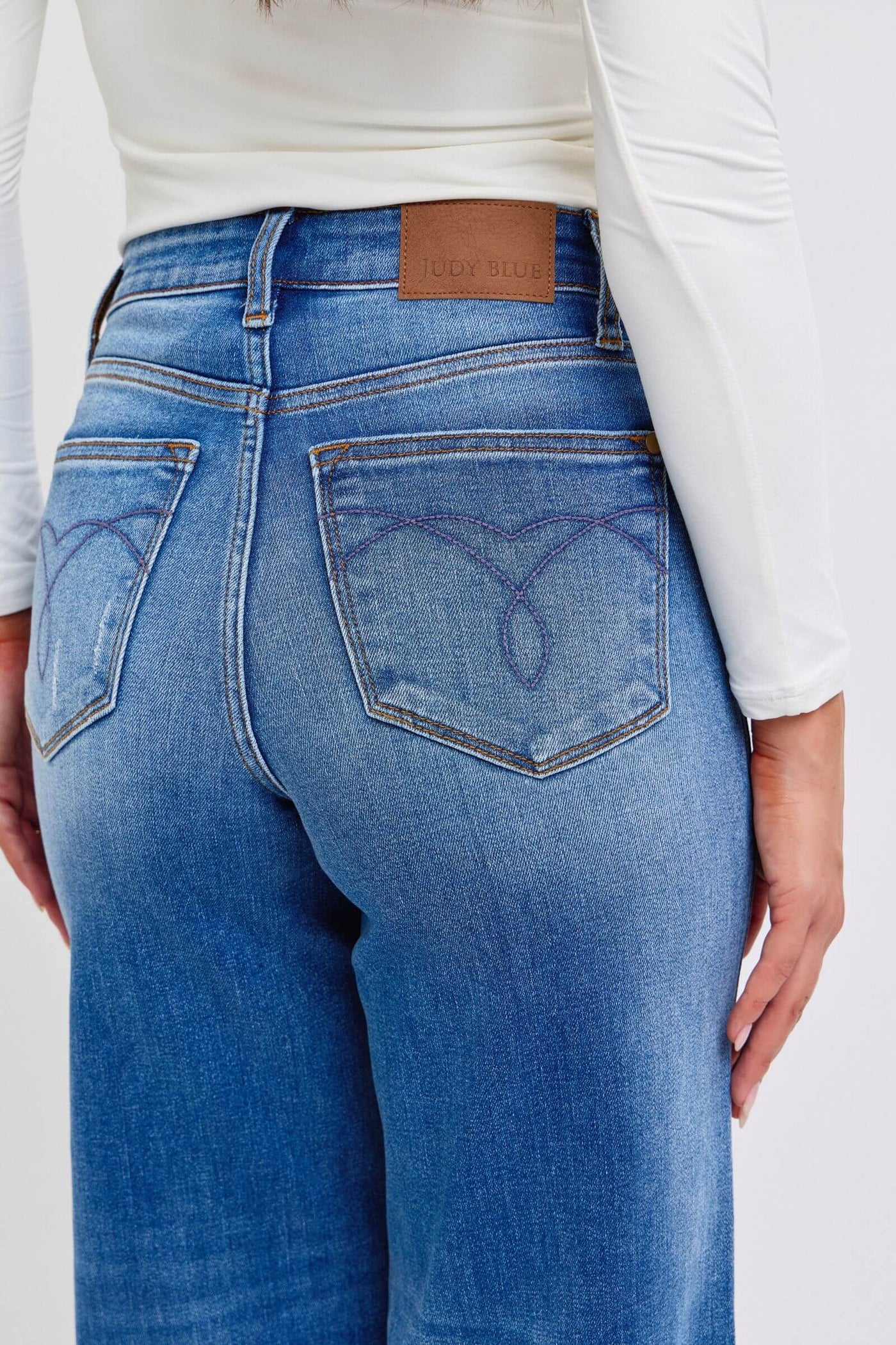 Judy Blue Full Size Distressed High Waist Wide Leg Jeans | Sleek Denim Boutique.