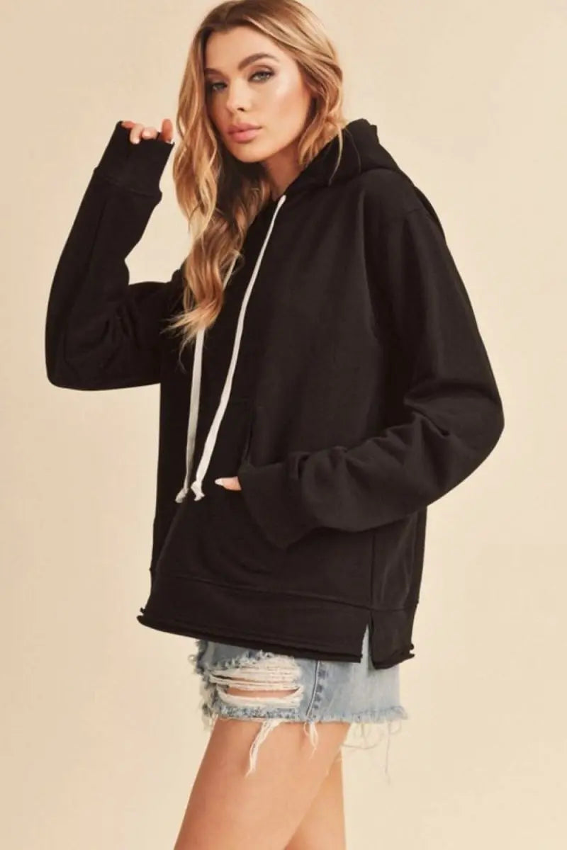 Aemi + Co Raw Hem Kangaroo Pocketed Drawstring Hoodie - Sleekdenim.com