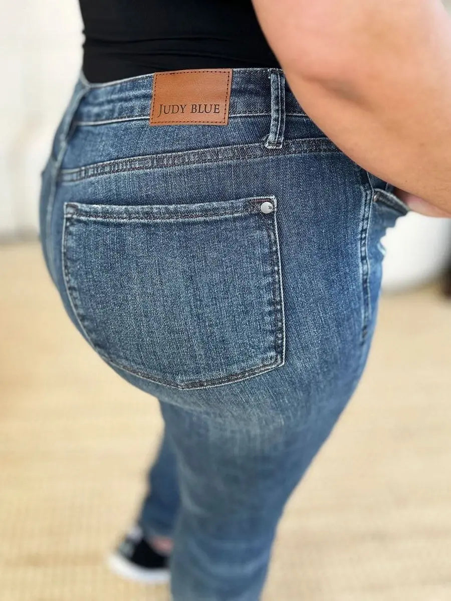 Judy Blue Full Size Mid Waist Distressed Slim Jeans - Sleekdenim.com