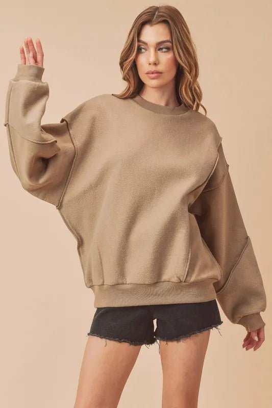 Aemi + Co Exposed Seam Round Neck Drop Shoulder Sweatshirt - Sleekdenim.com