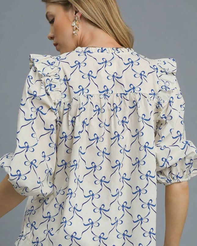 Umgee Ruffled Bow Print Notched Blouse - Sleekdenim.com
