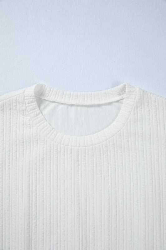 Solid Textured Drop Shoulder Peplum Top - Sleekdenim.com