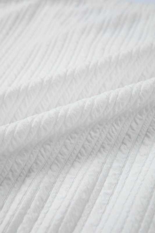 Solid Textured Drop Shoulder Peplum Top - Sleekdenim.com