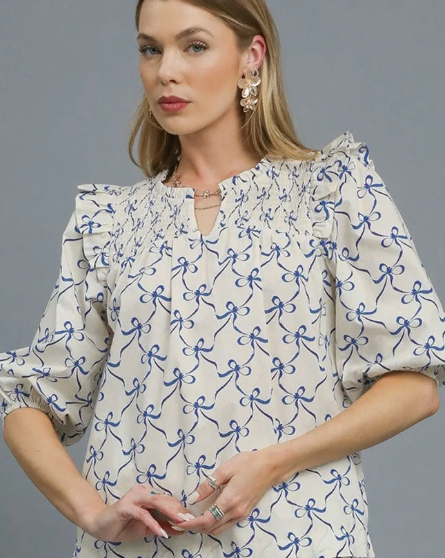 Umgee Ruffled Bow Print Notched Blouse - Sleekdenim.com