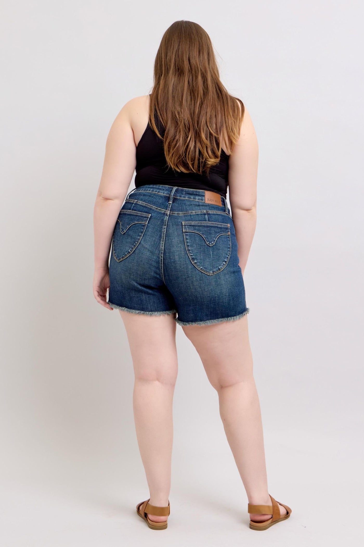 Judy Blue Tummy Control Fray Hem & Shield Back Pockets Denim Shorts | Sleekdenim.com