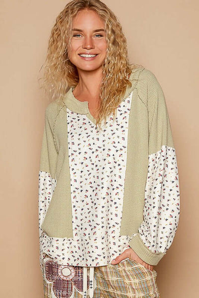 a girl wearing POL Waffle Knit Floral Notched Long Sleeve Top