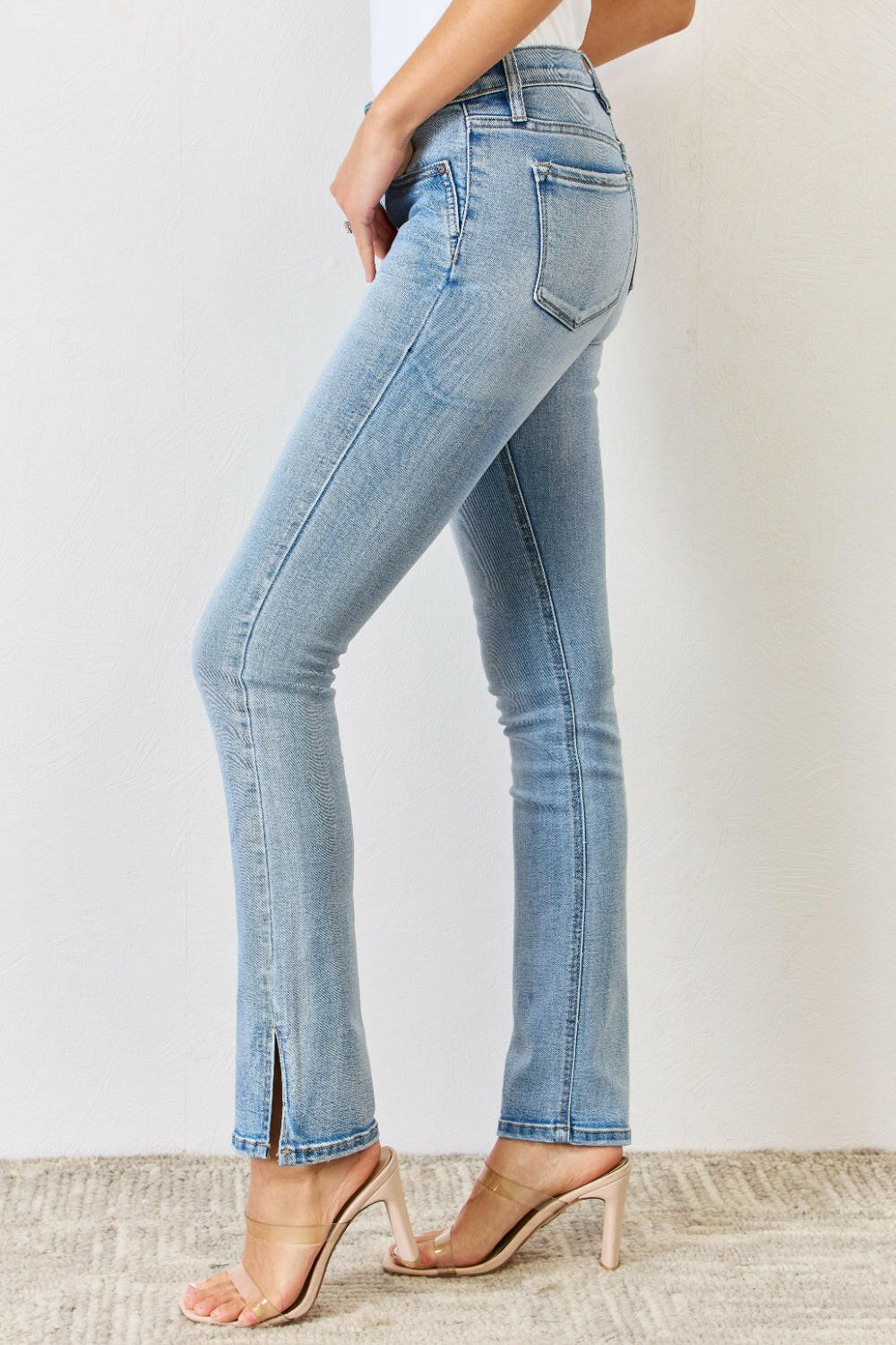 Kancan Full Size Mid Rise Y2K Slit Bootcut Jeans in light denim | Sleekdenim.com