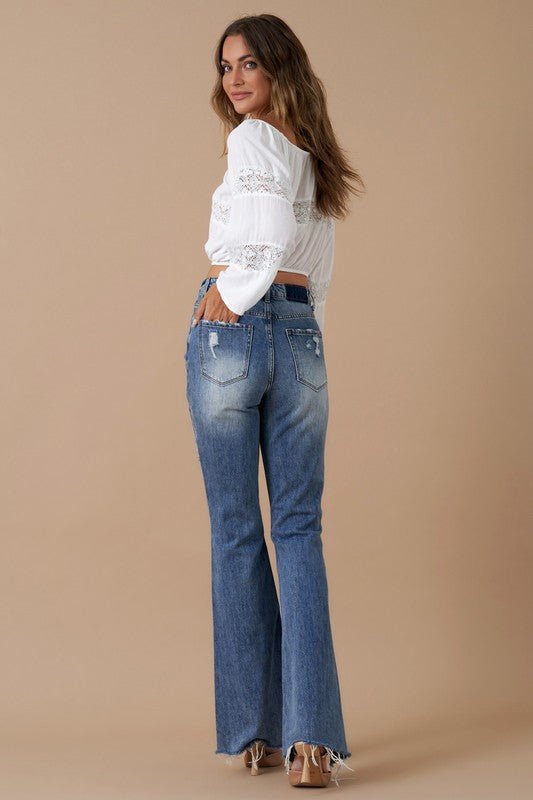 INSANE GENE HIGH RISE SLIT HEM FLARED JEANS - Sleekdenim.com