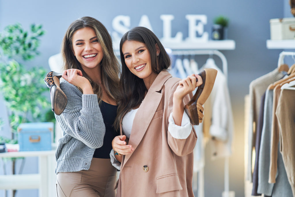 two-happy-girls-on-shopping-holding-shoes-2025-01-08-04-35-50-utc.jpg__PID:64d7c3dc-62c9-4786-b842-ca26d4922664